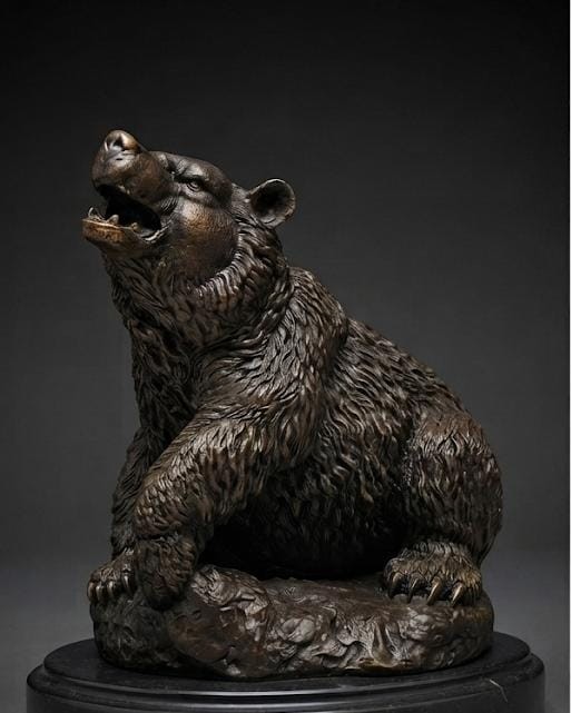 Bronze sculpture of a roaring bear