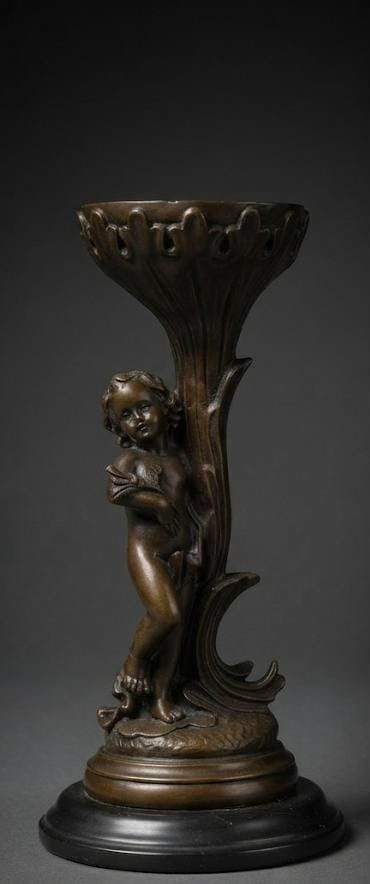 Pair of 2 Bronze sculpture of a child holding flowers in hand