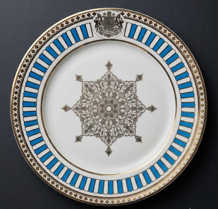 Mappin and Webb decorative plate with blue and white border.